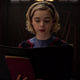 Sabrina sings a haunting tune.